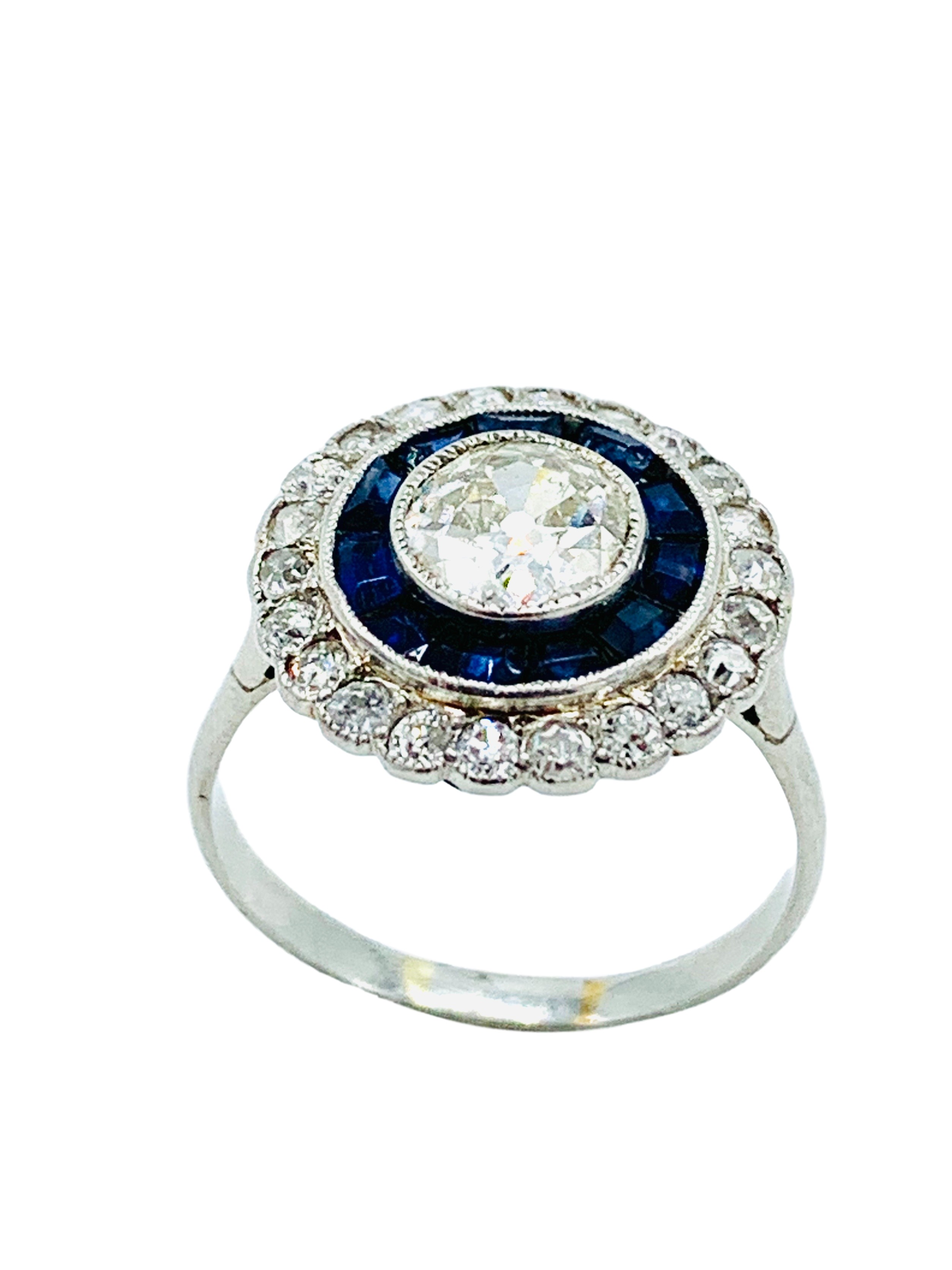 White gold, sapphire and diamond two row target ring.