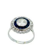 White gold, sapphire and diamond two row target ring.