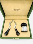 Christofle boxed champagne opener and bottle stopper.