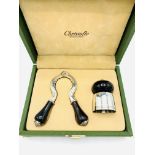 Christofle boxed champagne opener and bottle stopper.