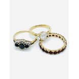 Three 9ct gold and precious stone rings