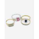 Collection of four 9ct gold rings set with various precious stones