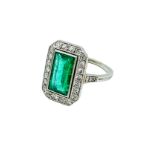 18ct white gold diamond and emerald ring.