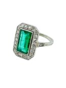 18ct white gold diamond and emerald ring.