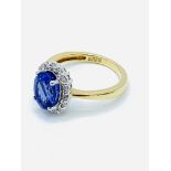 18ct gold, tanzanite and diamond ring.