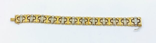 750 white and yellow gold link bracelet.