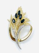 9ct gold diamond and sapphire brooch.