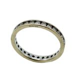 18ct white gold channel set diamond eternity ring.