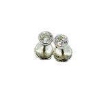 Diamond stud earrings.