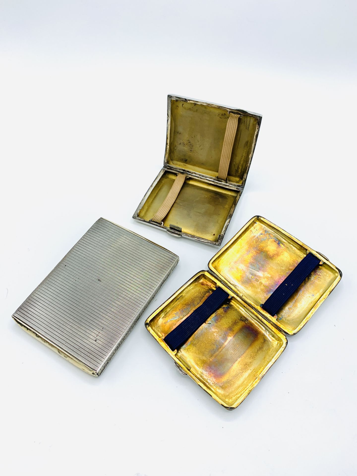 Silver engine-turned cigarette case; silver cigarette case, white and yellow metal cigarette. - Image 4 of 4