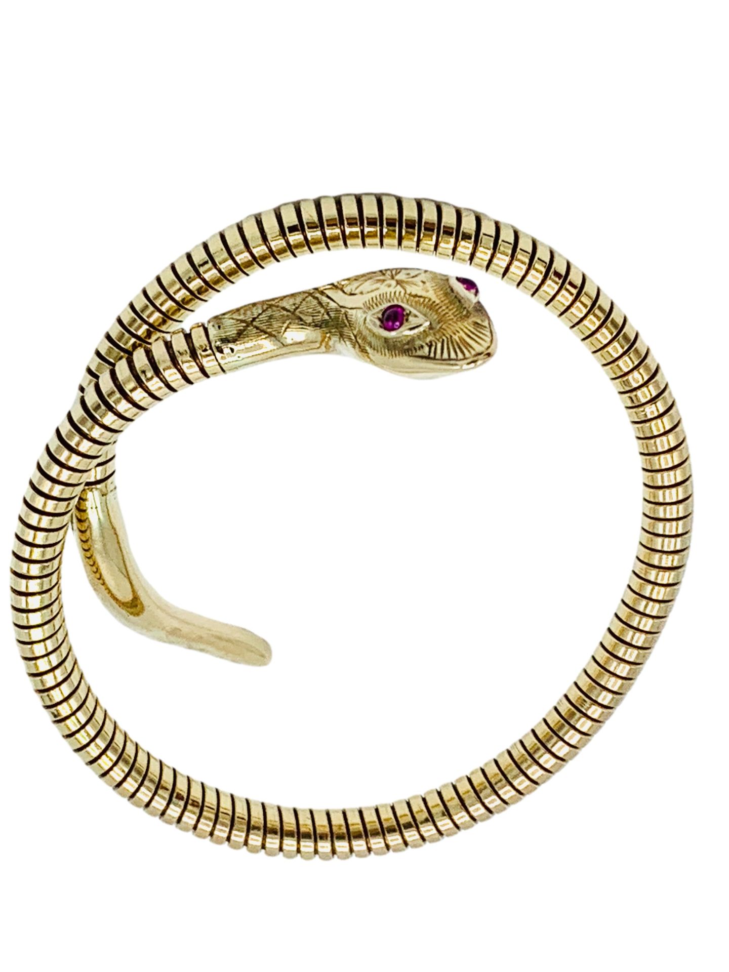 9ct gold snake bracelet with red stone eyes.