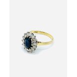 18ct gold, diamond and deep royal blue sapphire ring.