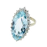 18ct white gold aquamarine and diamond marquise cluster ring.