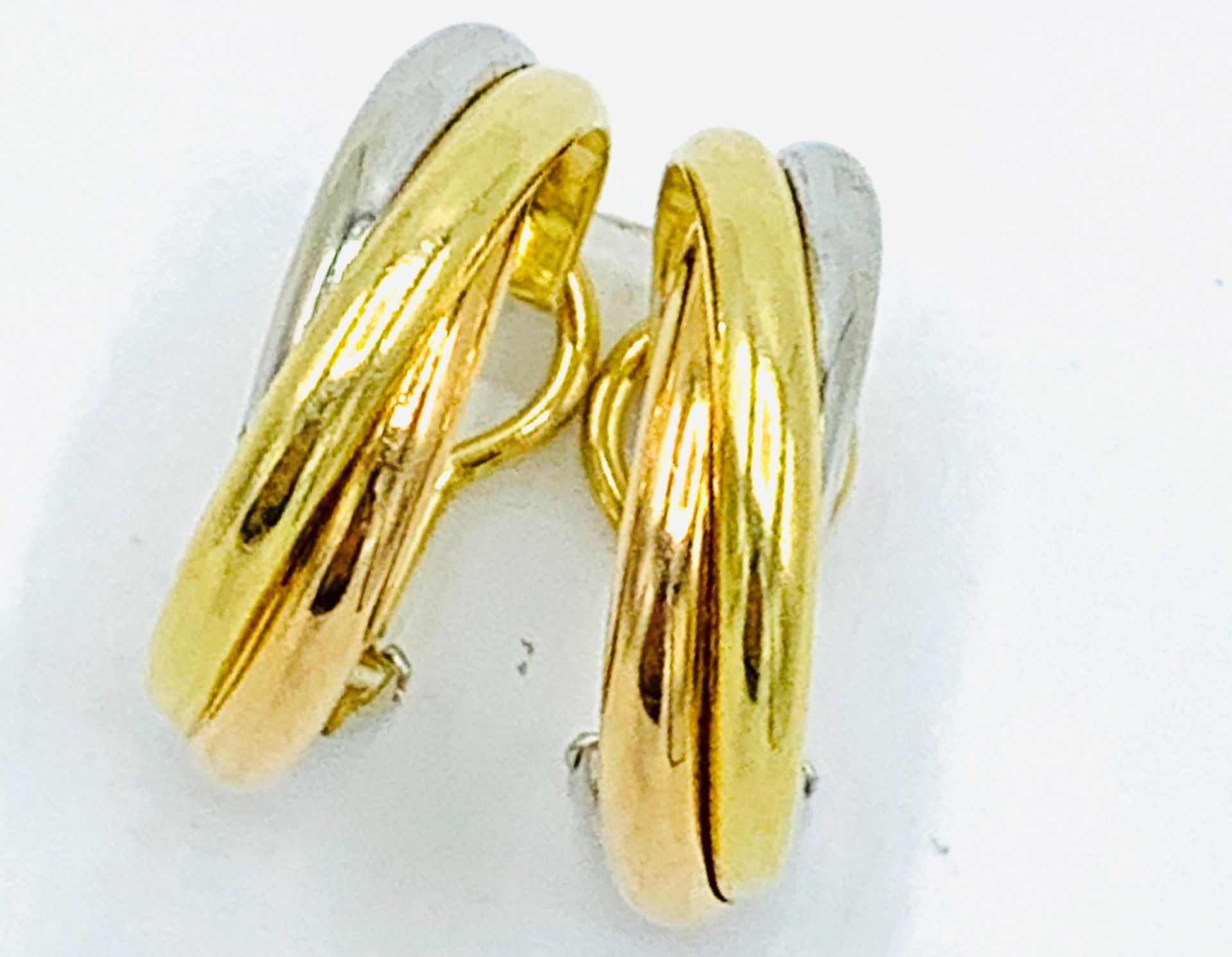 18ct gold Cartier three colour twist earrings.