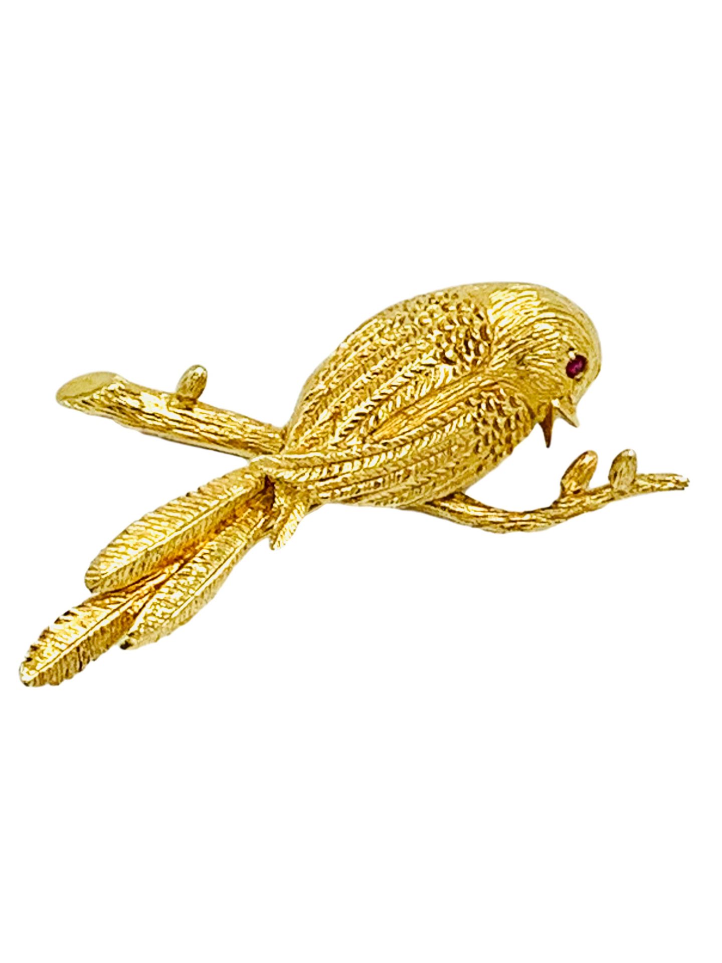 18ct gold Boucheron, Paris bird brooch with ruby eye.