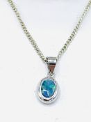 Black opal and white gold pendant and chain.