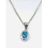 Black opal and white gold pendant and chain.