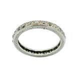 White gold and platinum diamond eternity ring.