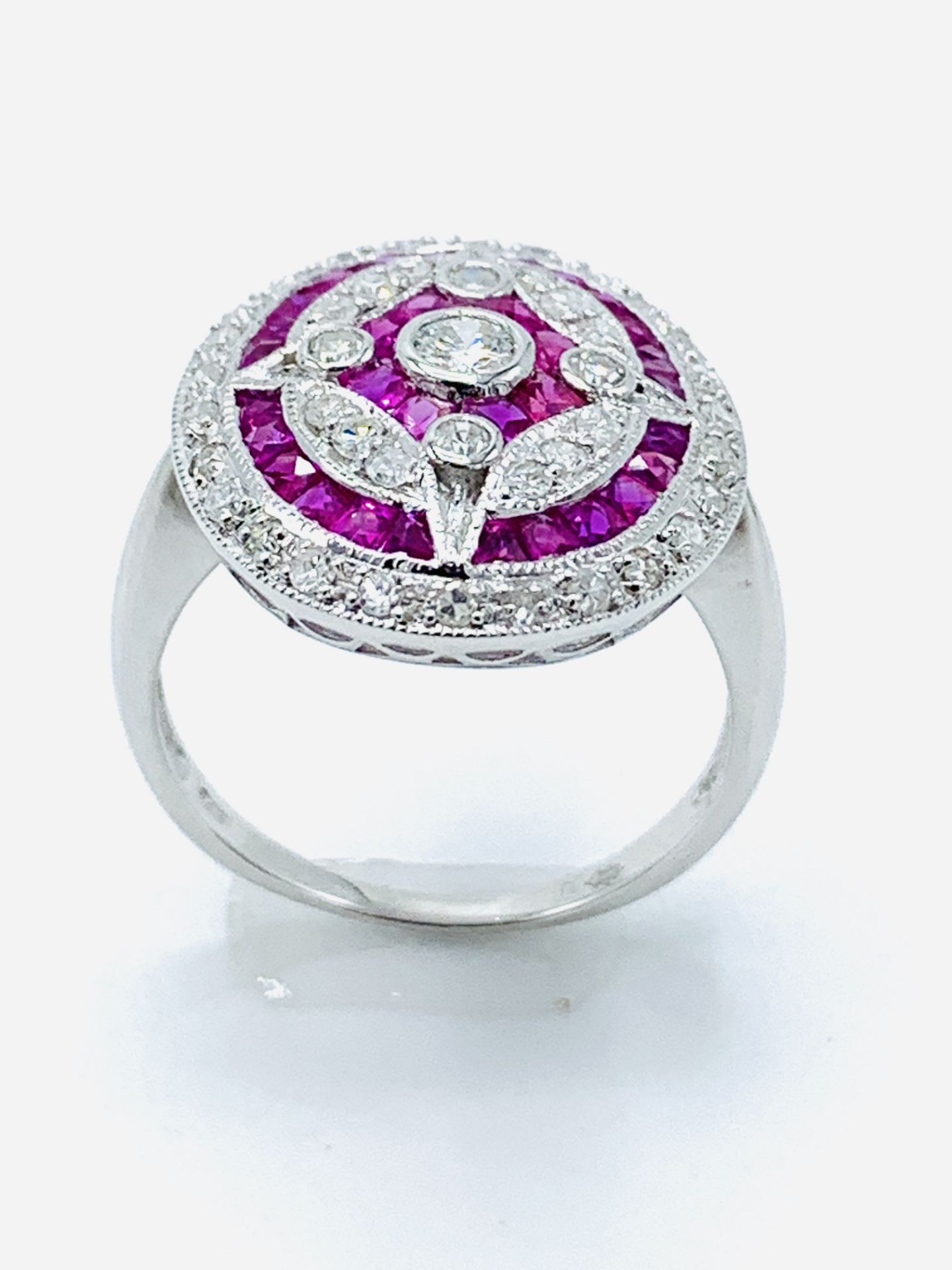 14ct white gold ruby and diamond target ring.