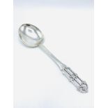 Hand pierced and engraved arts and crafts serving spoon.