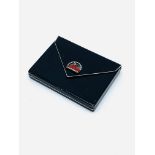 French silver dance card case with diamond and red malachite clasp.