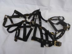 4 black webbing pony headcollars in fair condition