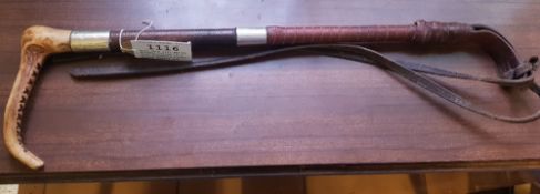 Hunt whip with silver collar stamped 'H.C. 1916 Schomberg, London', with a bone handle and leather t