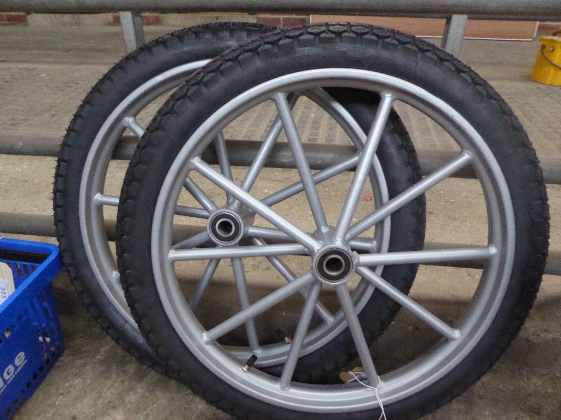 Pair of wheels and tyres, 18ins - carries VAT.