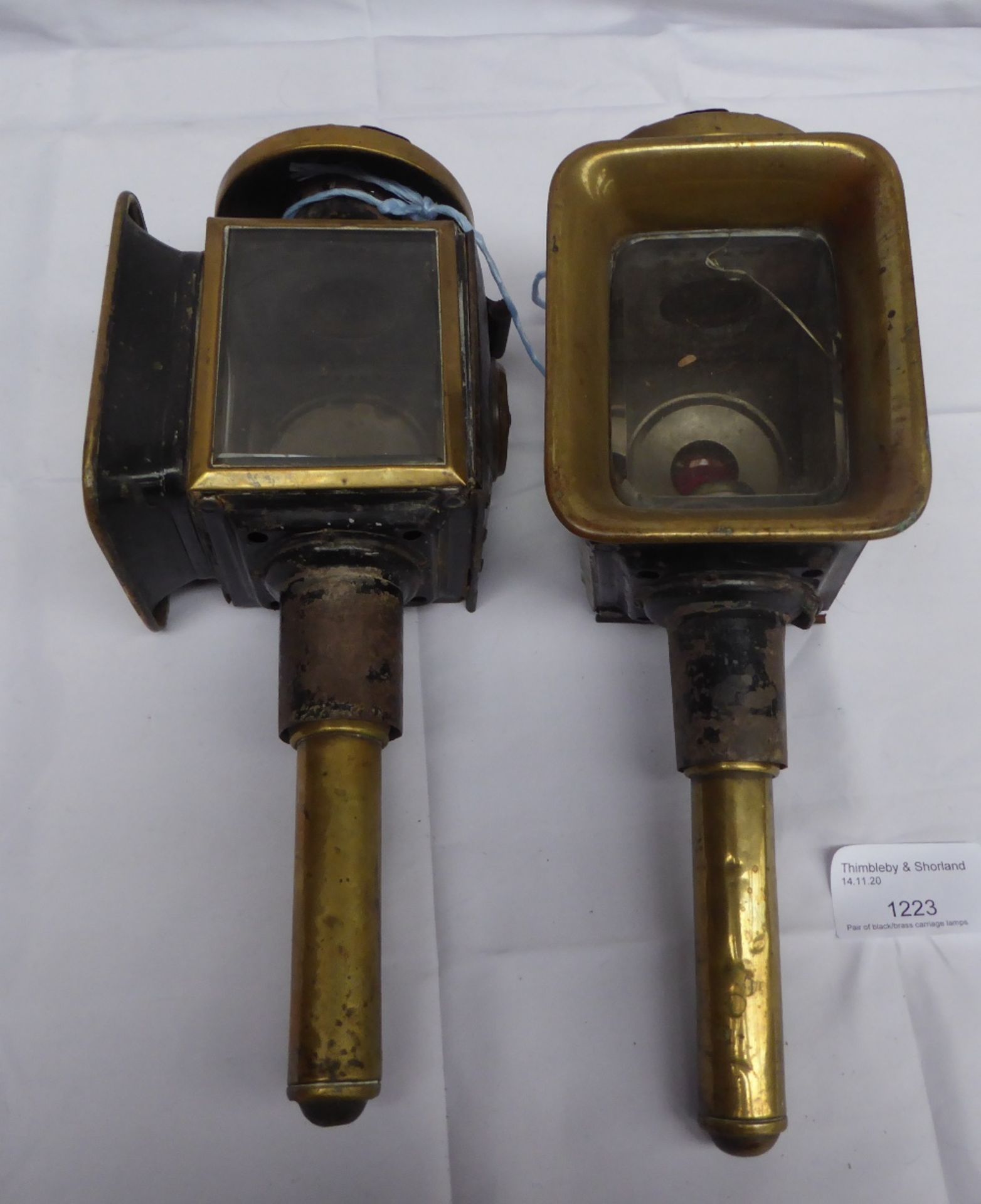 Pair of black/brass carriage lamps with square fronts; crack in one lens - carries VAT