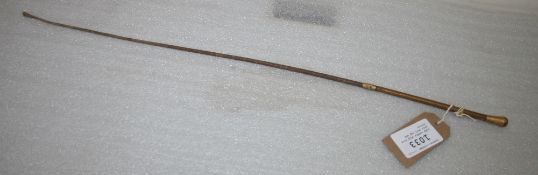 Side saddle whip with gilt butt cap and collar