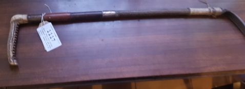 Hunt whip with hallmarked silver collar engraved with initials E G S, and bone handle; needs some re