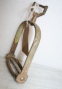 Large ornate swivel tread/eye stirrup