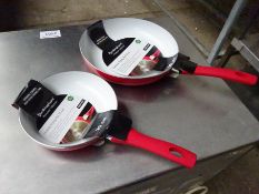 Two frying pans.
