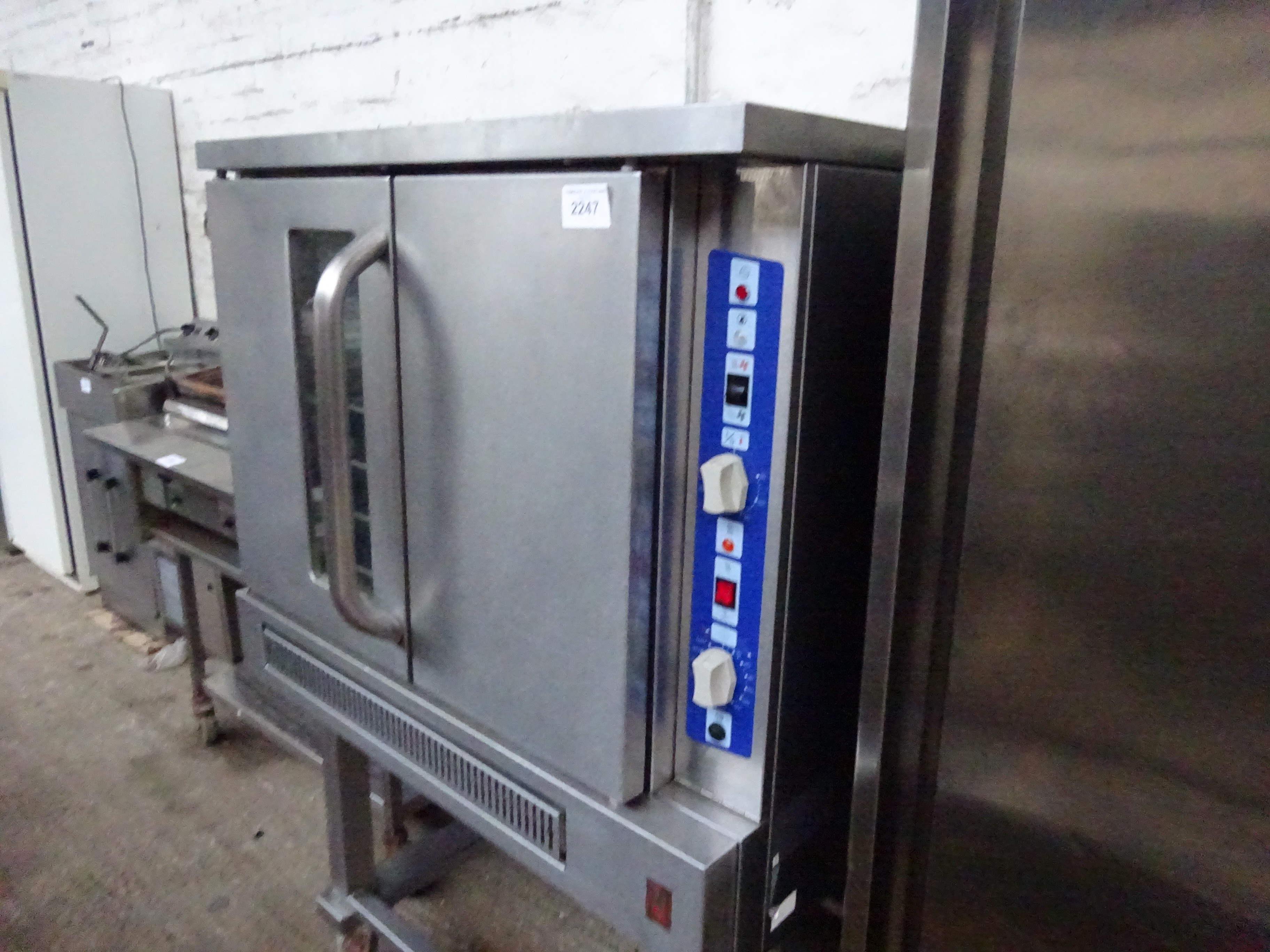 Falcon natural gas convection oven on mobile stand.