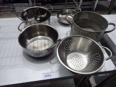 Quantity of stainless steel pots.