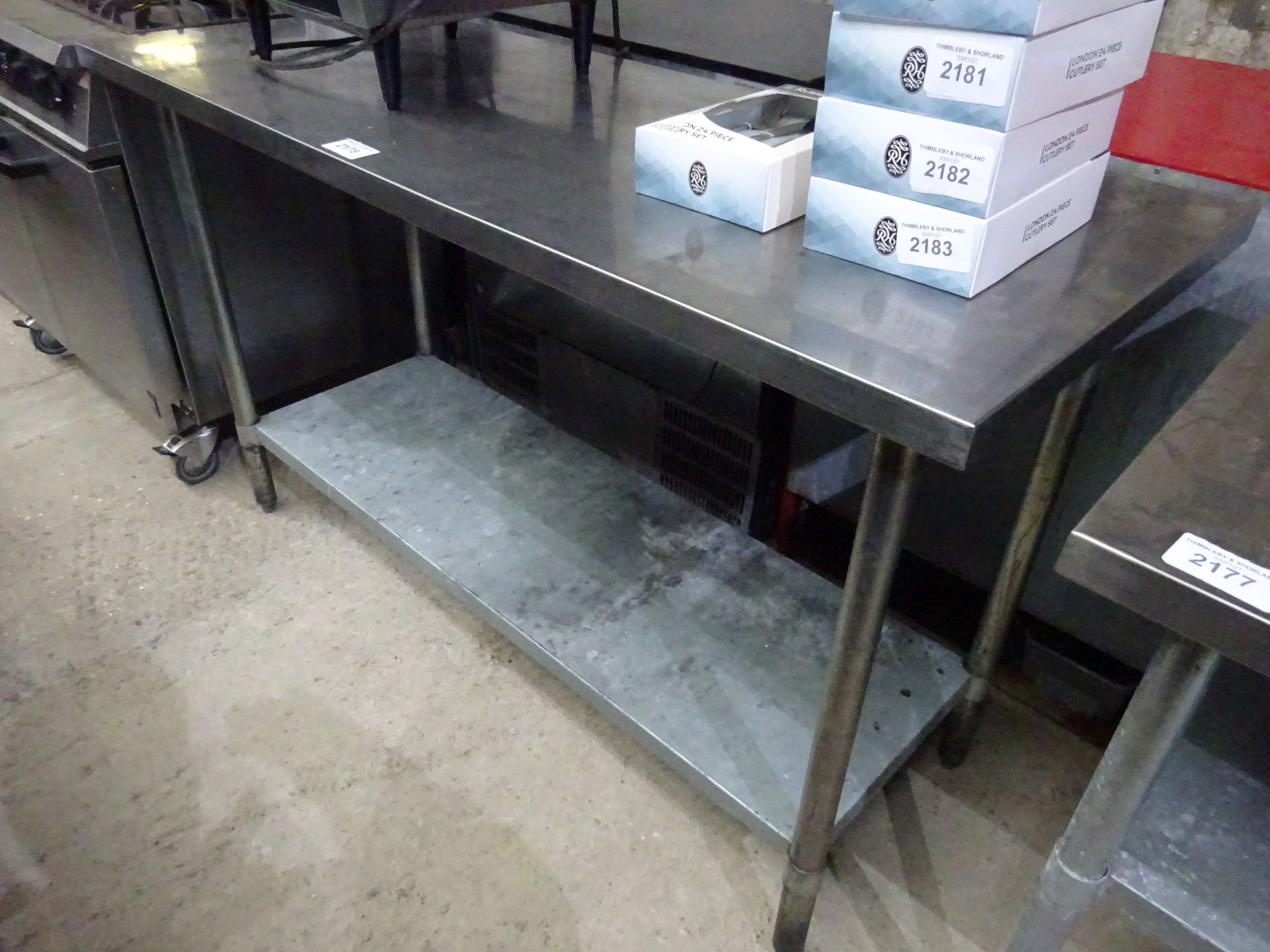 Stainless steel table with under shelf, 150cms.