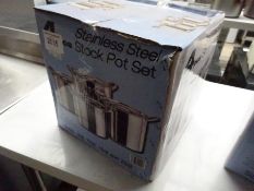 4 new stainless steel stock pot set.