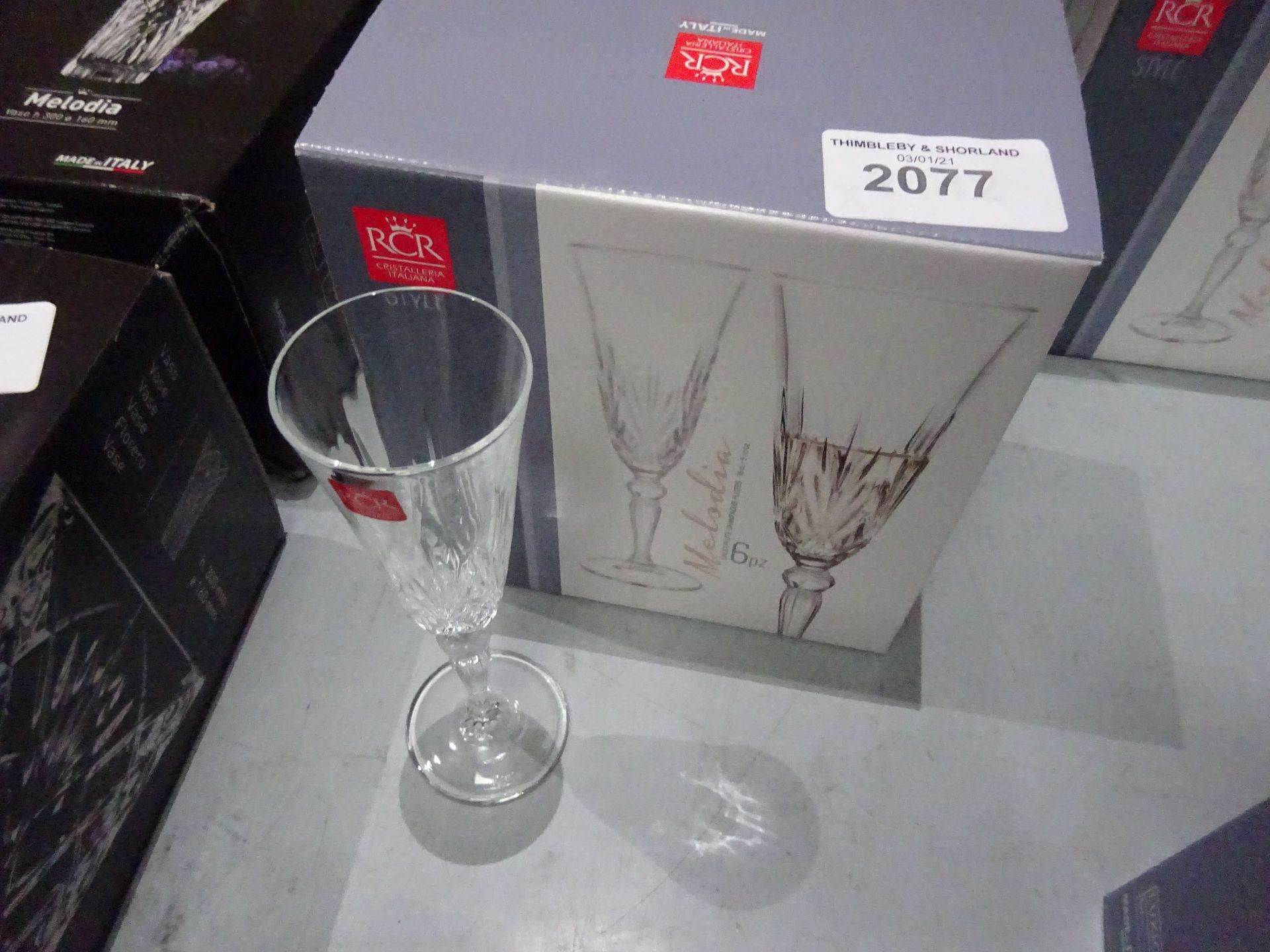 6 new Melodia crystal champagne flutes.