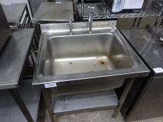 Stainless steel sink on stand with taps, 74cms.