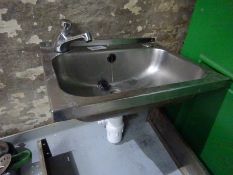 Stainless steel hot water sink.