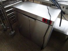 Stainless steel under counter hot cupboard.