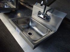 New hand wash sink with taps.