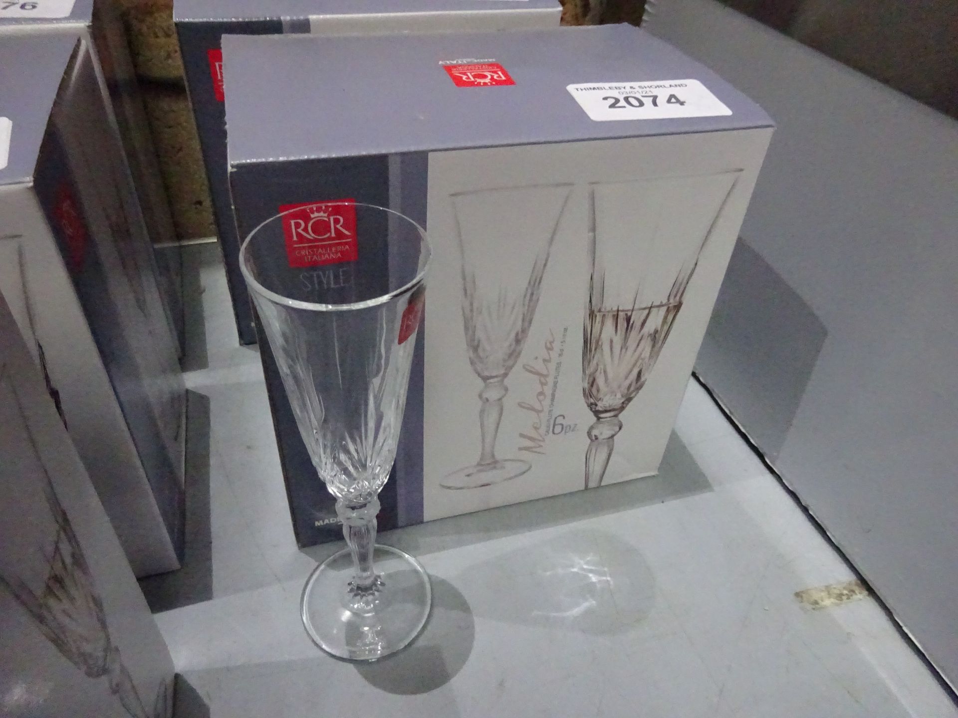 6 new Melodia crystal champagne flutes.