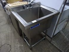 Stainless steel sink on stand with taps, 77cms.