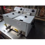 Infernus double table top fryer with front drain.