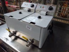 Infernus double table top fryer with front drain.