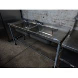 Double sink with taps.