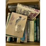 Box of books on gardening and other outdoor pursuits.