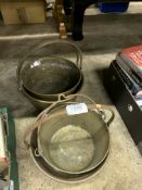 Four brass preserving pans.