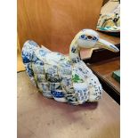 Ceramic mosaic swan figure.